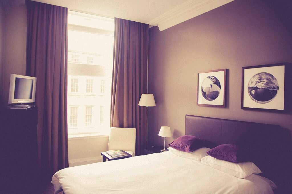 Elegant hotel bedroom showing what makes a hotel five star