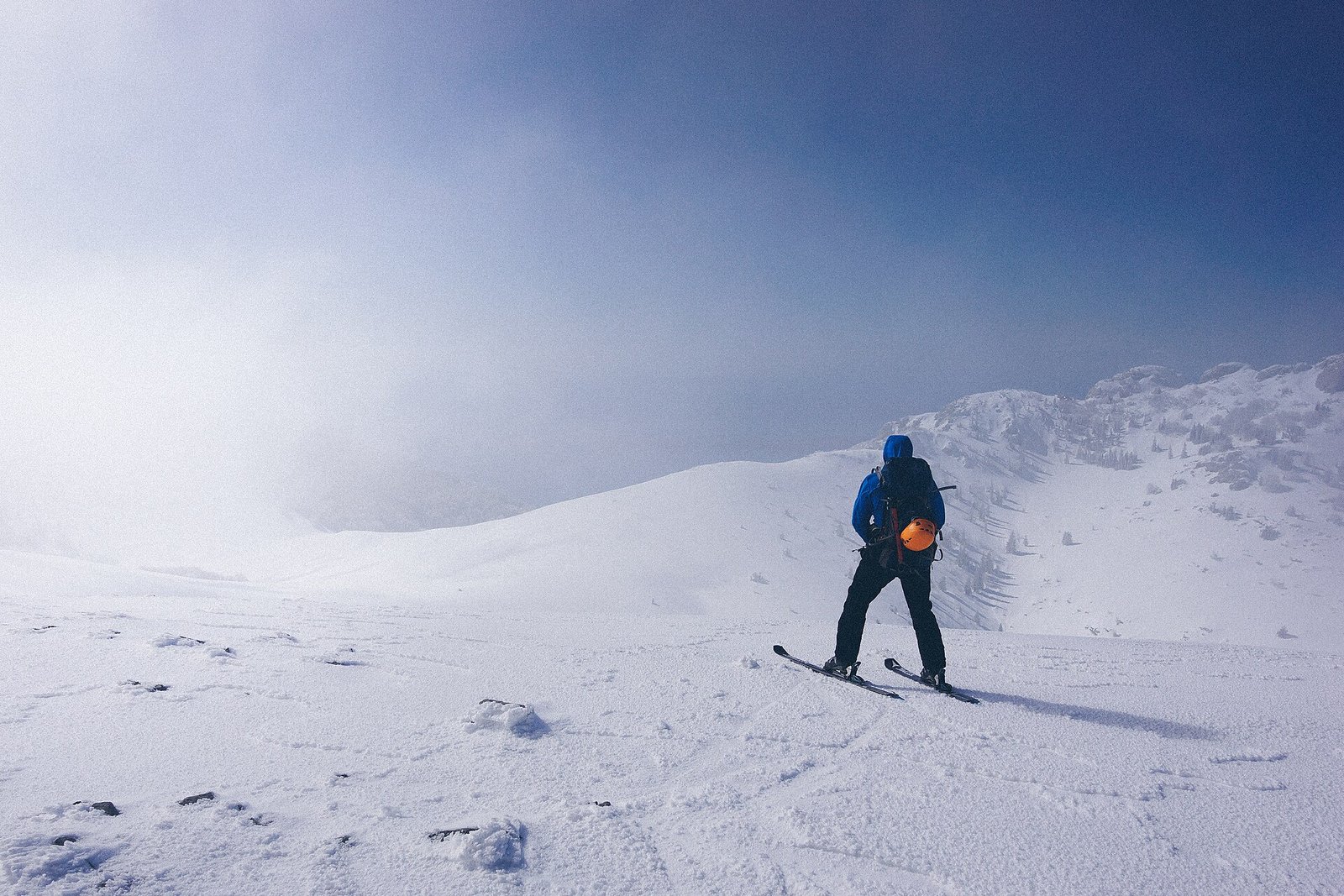 Skier on fresh snow at one of the best luxury ski resorts