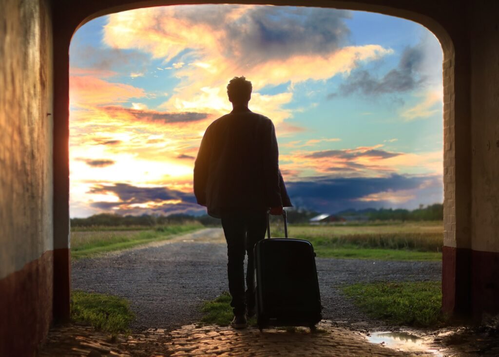 Traveler with a suitcase, packing for a luxury vacation
